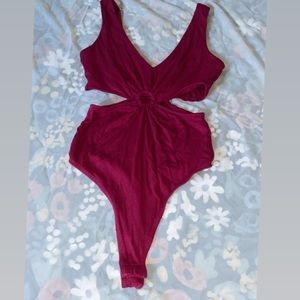 Magenta colored bodysuit